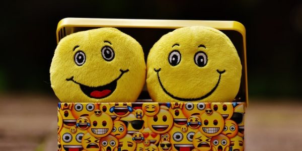 a box printed with happy emoticons