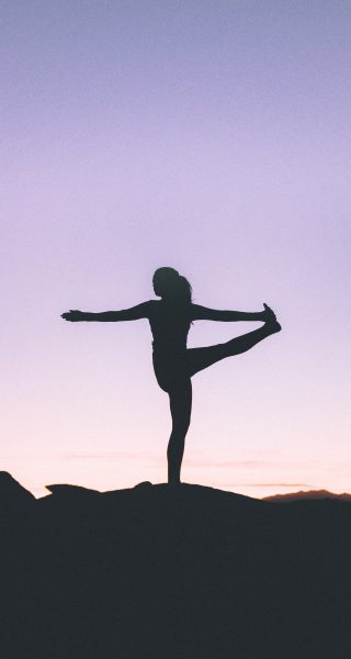 silhouette of a woman working out