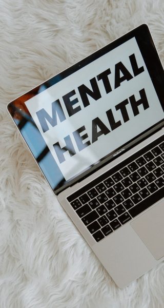 Mental health written on a laptop