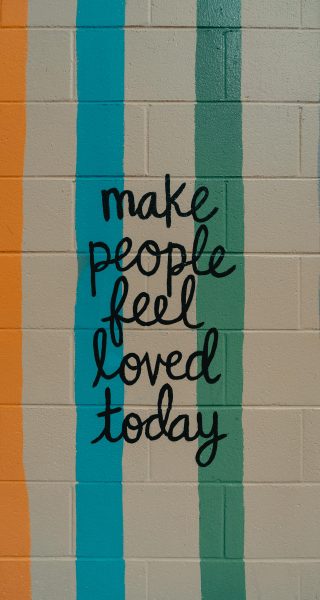 a quote about kindness written on a wall